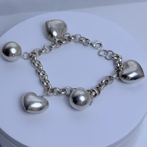 Elegant Silver Heart Charm Bracelet